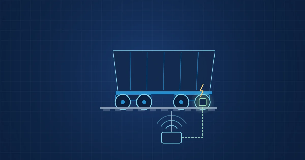 Illustration: a freight wagon with an energy-autonomous axle-box sensor and a trackside RFID reader post