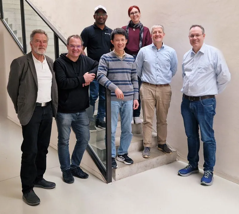 e-LAS+ project partners on the stairs at Fraunhofer IDMT in Ilmenau