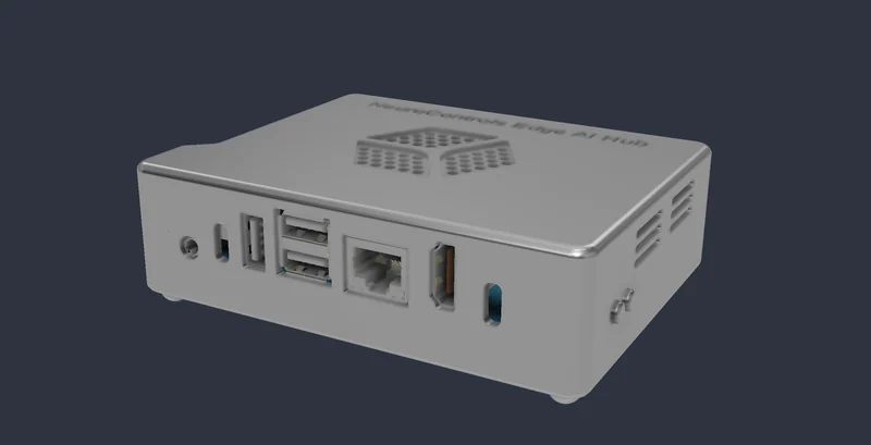 Produktrendering des Edge AI Hub: silbernes Gehäuse mit der Gravur „NeuroControls Edge AI Hub“, Anschlüsse an der Vorderseite